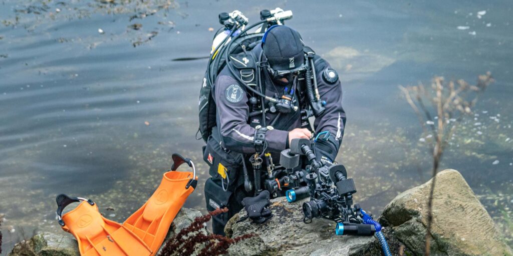 ross in diving kit, going scuba diving with a newborn baby